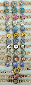 JewelryVilla Hemp chokers with fimo beads, hemp necklaces with fimo beads, smiley faces, skulls, mushrooms, flowers, butterflys, ocean waves, hearts